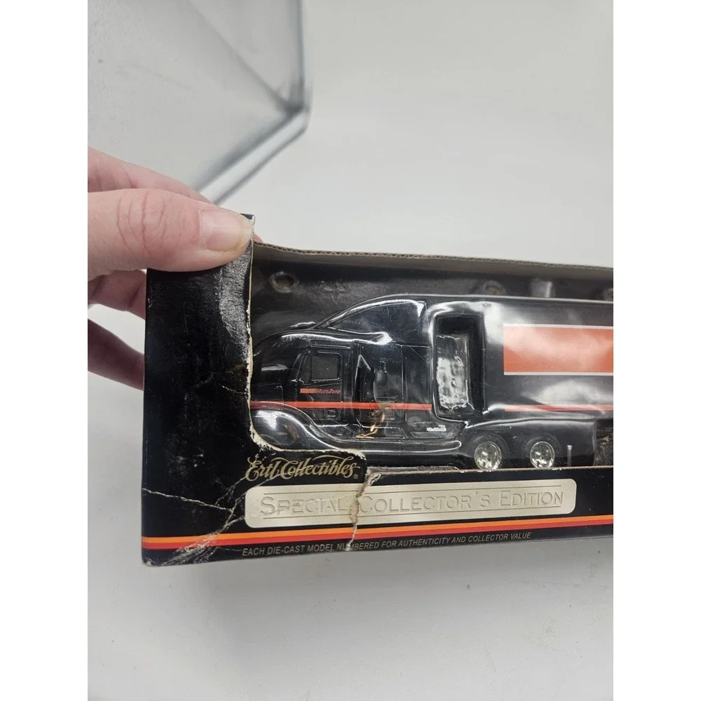 Ertl Collectibles 1:64 Diecast Freightliner Century AutoZone Black Orange Semi